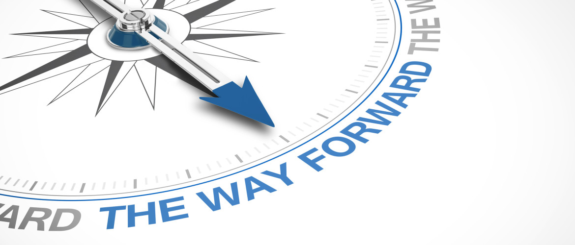 Compass pointing to 'the way forward' text